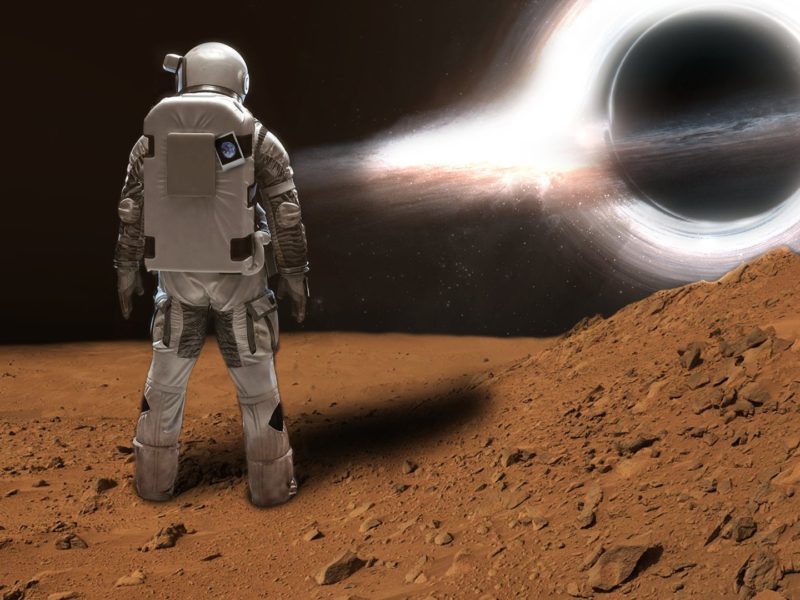 Astronaut Looking At A Black Hole.
