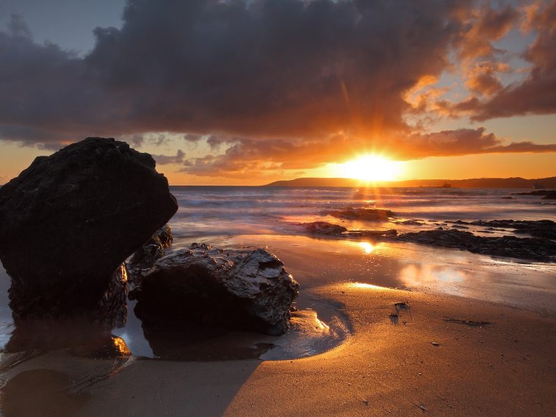Beach Sunset Landscape Between Rocks